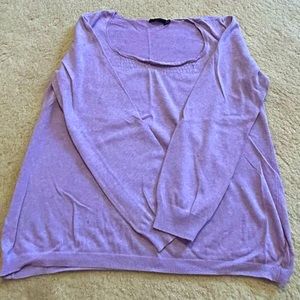 Purple sweater with design by collar
